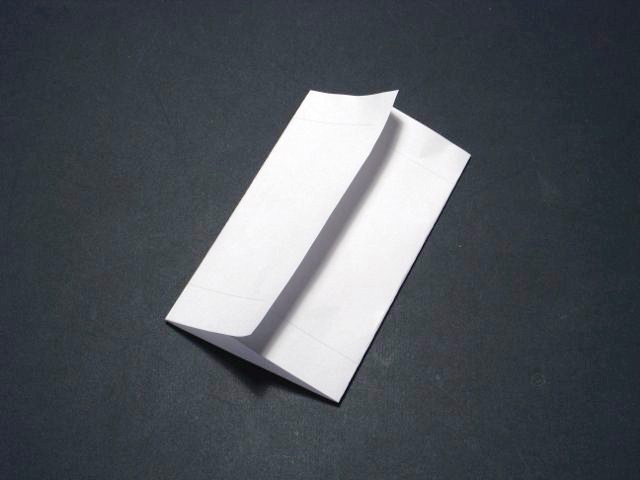 Fold over two sides of seed packet