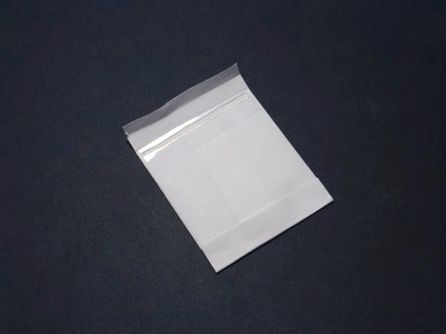 Secure the seed packet with Glue Dots Continuous Lines