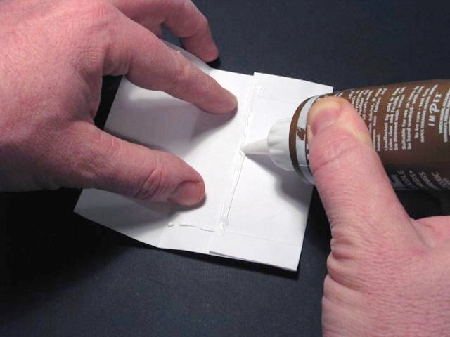 Glue one folded side